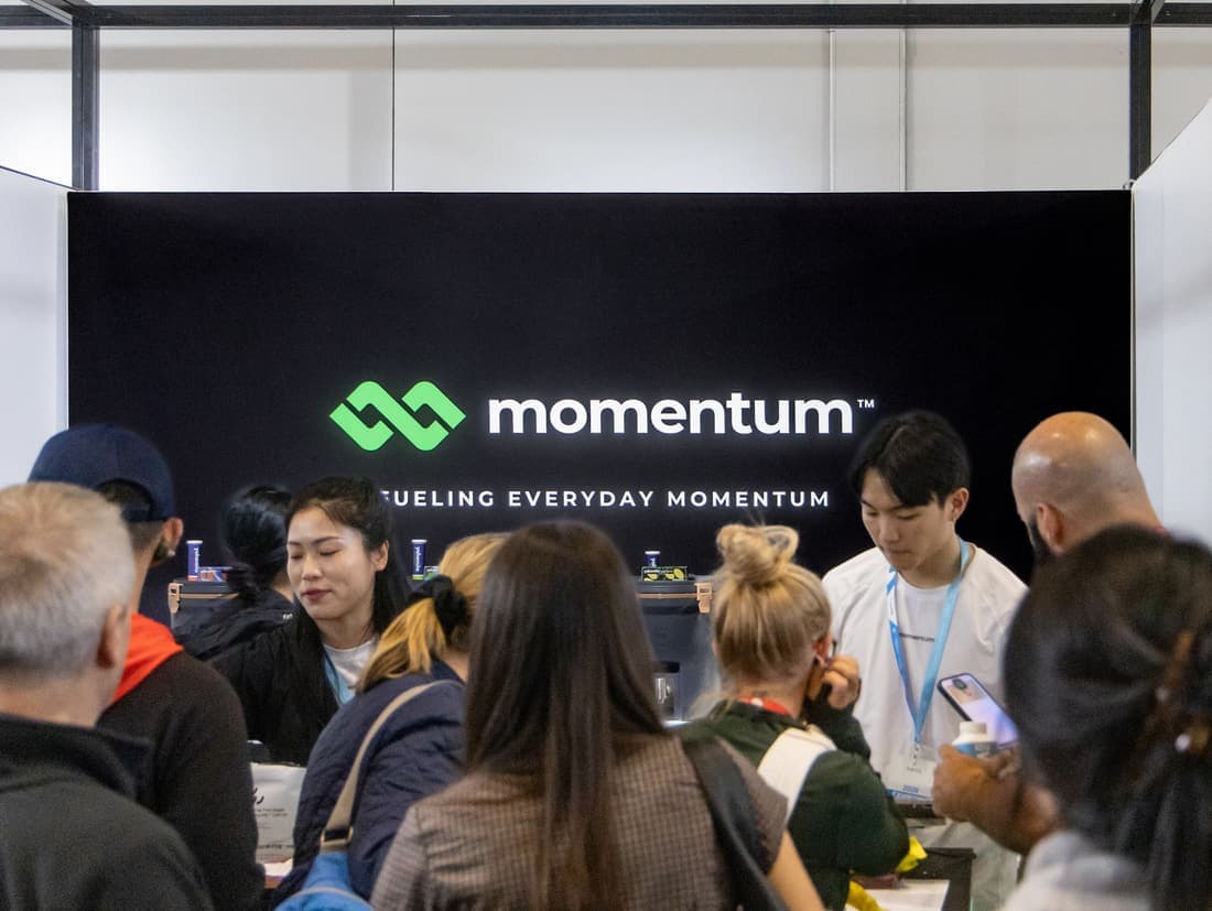 Visitors gathered at the momentum stand at the expo